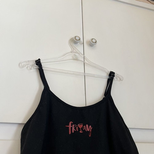 Black pajama top like new, sleeveless with design