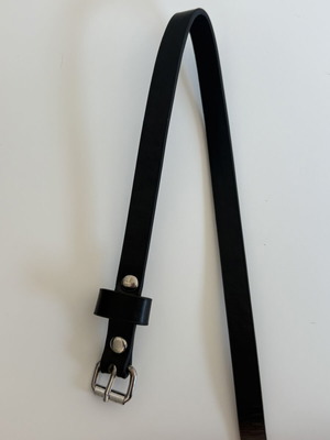 Black slim belt with silver buckle and studs, minimal style