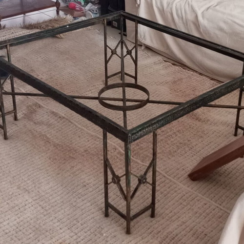 Metal table used with ceramic decoration and antique finish