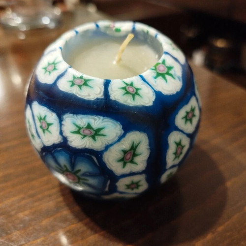 Handmade Millefiori candle like new, decorative with blue floral design