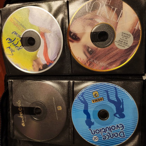 Set of 48 used music CDs with free case