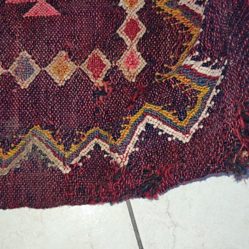 Old woven double horse saddle bag used with fabric tears