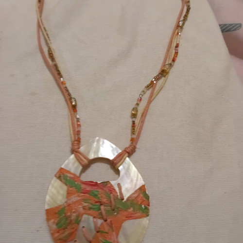 Handmade necklace with large mother of pearl pendant in orange and green like new
