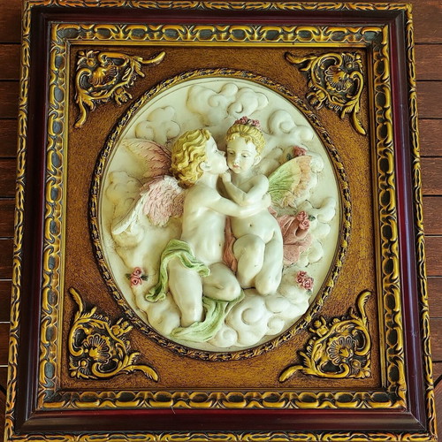 Relief wall art used in ornate frame 56x50cm