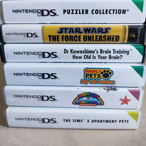 Nintendo 3DS (2011) like new, complete bundle with 12 games and accessories