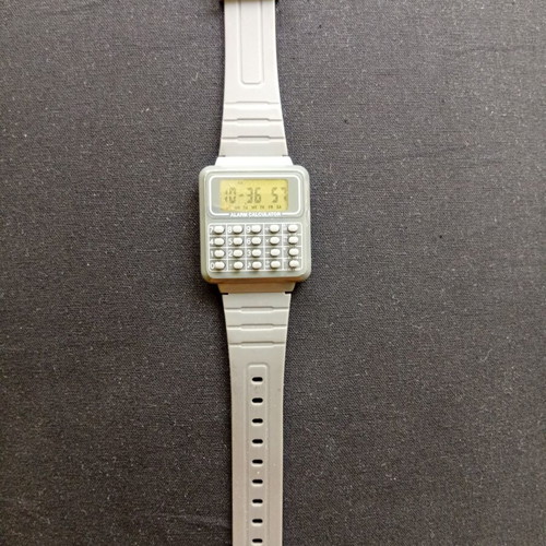 Digital watch with calculator used, unisex, gray