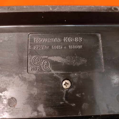 Rowenta vintage sandwich maker used with enamel surfaces orange color