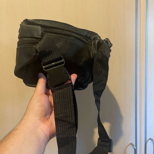 Black waist bag like new with minor zipper defect