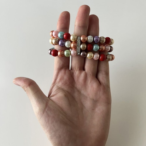 Multicolor beaded bracelet with silver-tone spacers, layered design