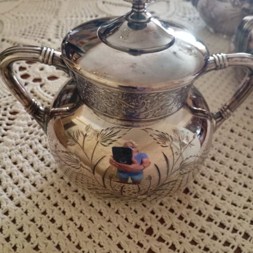 Antique silver plated teapot, sugar bowl and creamer like new