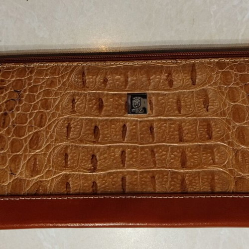 KEM leather handbag with crocodile pattern and tan details