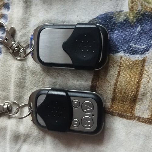 Garage door remote new, single piece