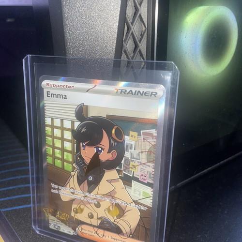 Emma Trainer card new condition in sleeve and top loader
