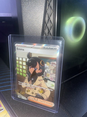 Emma Trainer card new condition in sleeve and top loader