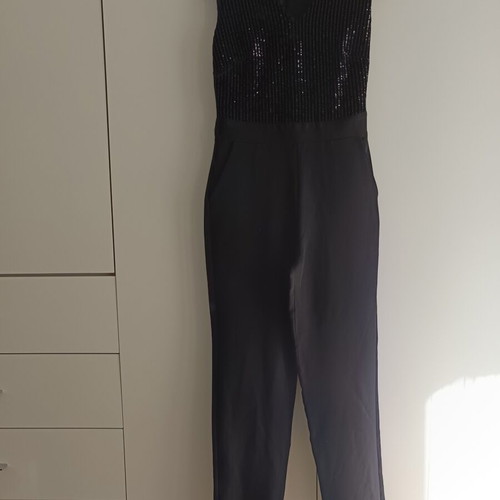 Black jumpsuit size M like new with sequins
