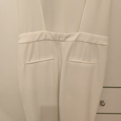 Zara white jumpsuit with open back, slim fit, pockets