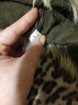 Fur wolf hat like new, size L, brown