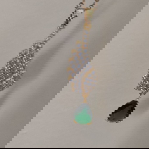 Κολιέ ατσάλινο χρυσό με δάκρυ σμαράγδι και φτερό αγγέλου καινούργιο