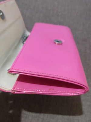 Pink clutch bag used