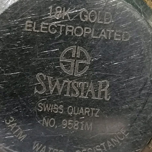 Swistar watch 18k gold plated used with visible signs of wear