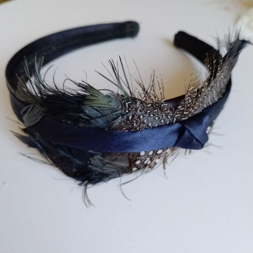 Blue women's headband with feathers used