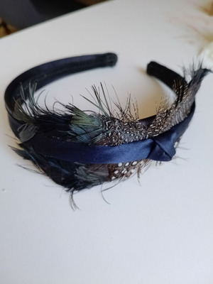 Blue women's headband with feathers used