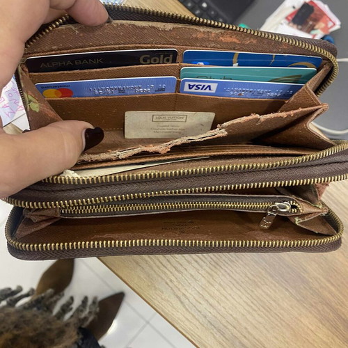 Louis Vuitton double zipper monogram wallet used, brown