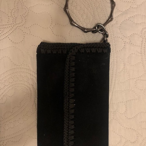 Black suede wristlet bag used