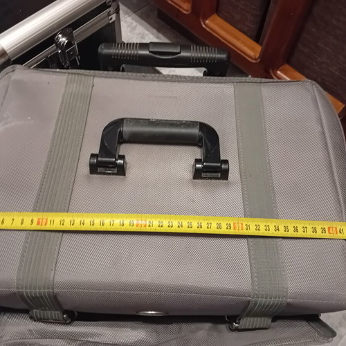 Suitcase fabric wheeled used with compartments for makeup organization
