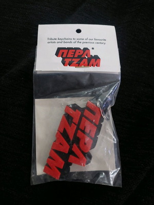 Pearl Jam keychain new, black and orange