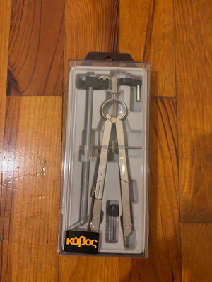 Metal drawing compass new with ring, extension and tips by Kyvos