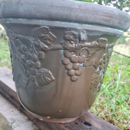 Ceramic planter used with embossed design