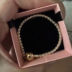 Pandora bracelet with 14K gold plating and round safety clasp like new