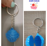Tupperware keychain new, blue cupcake cap