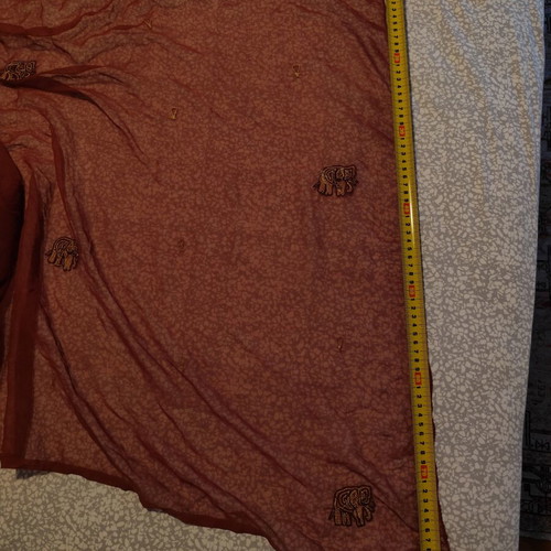 Long brown scarf used with embroidered elephants and paisley