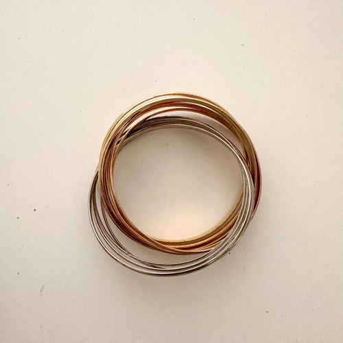 Infinity bracelet like new with mixed gold and silver tones