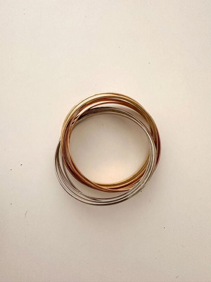 Infinity bracelet like new with mixed gold and silver tones
