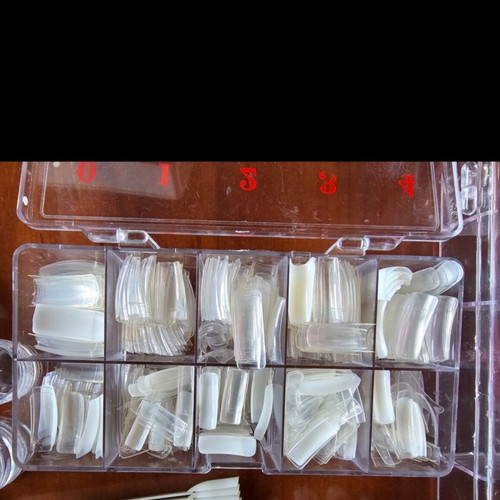 Nail art equipment used with tips, top coat, quickgel, and tools