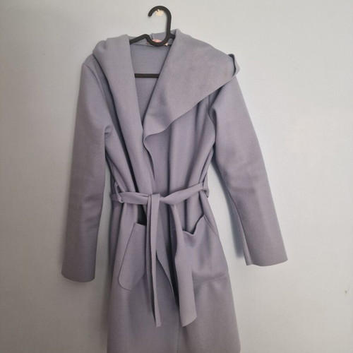 Coat used, muted light blue