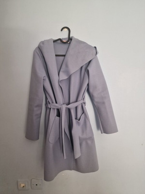 Coat used, muted light blue
