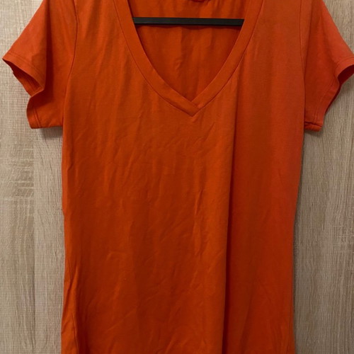 Women's orange blouse with short sleeves