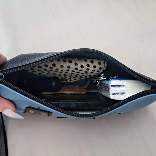Handmade leather crossbody bag with urban design