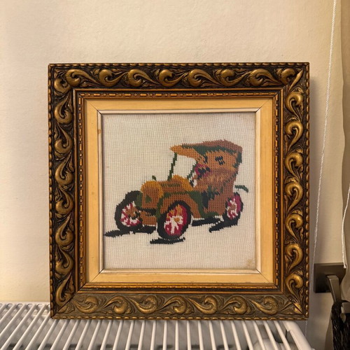 Vintage wooden frames used with hand-stitched car designs