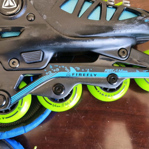 Inline Roller Firefly ABEC 1 64 mm adjustable size 29-32 with Globber protective gear like new