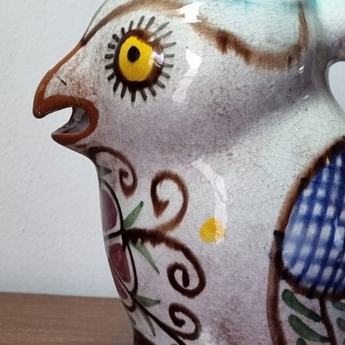 Ceramic owl pitcher used, broken and glued on the beak