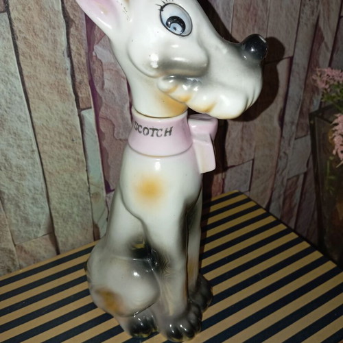 Vintage porcelain bottle shaped like a dog 26"