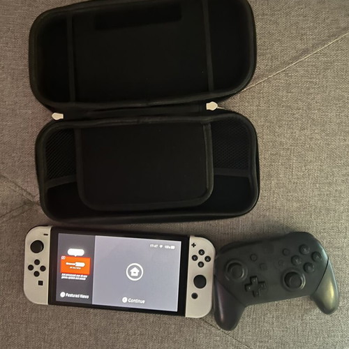 Nintendo Switch OLED white with Pro controller, 128GB SD card and carrying case