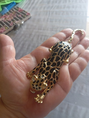 Vintage brooch with moving tail, like new
