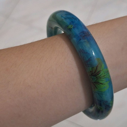 Petrol resin bracelet with flower designs like new