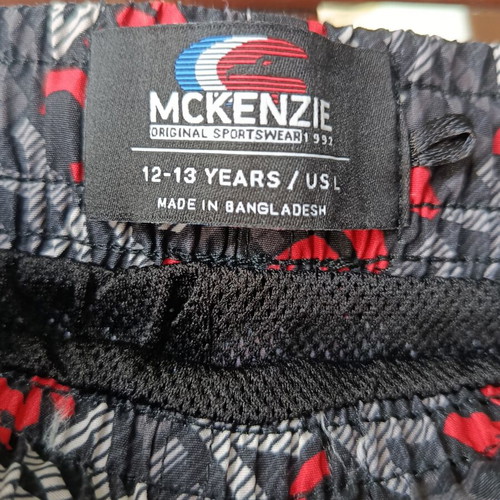 McKenzie Shorts Swimwear new, black with red print, size 12-13 years
